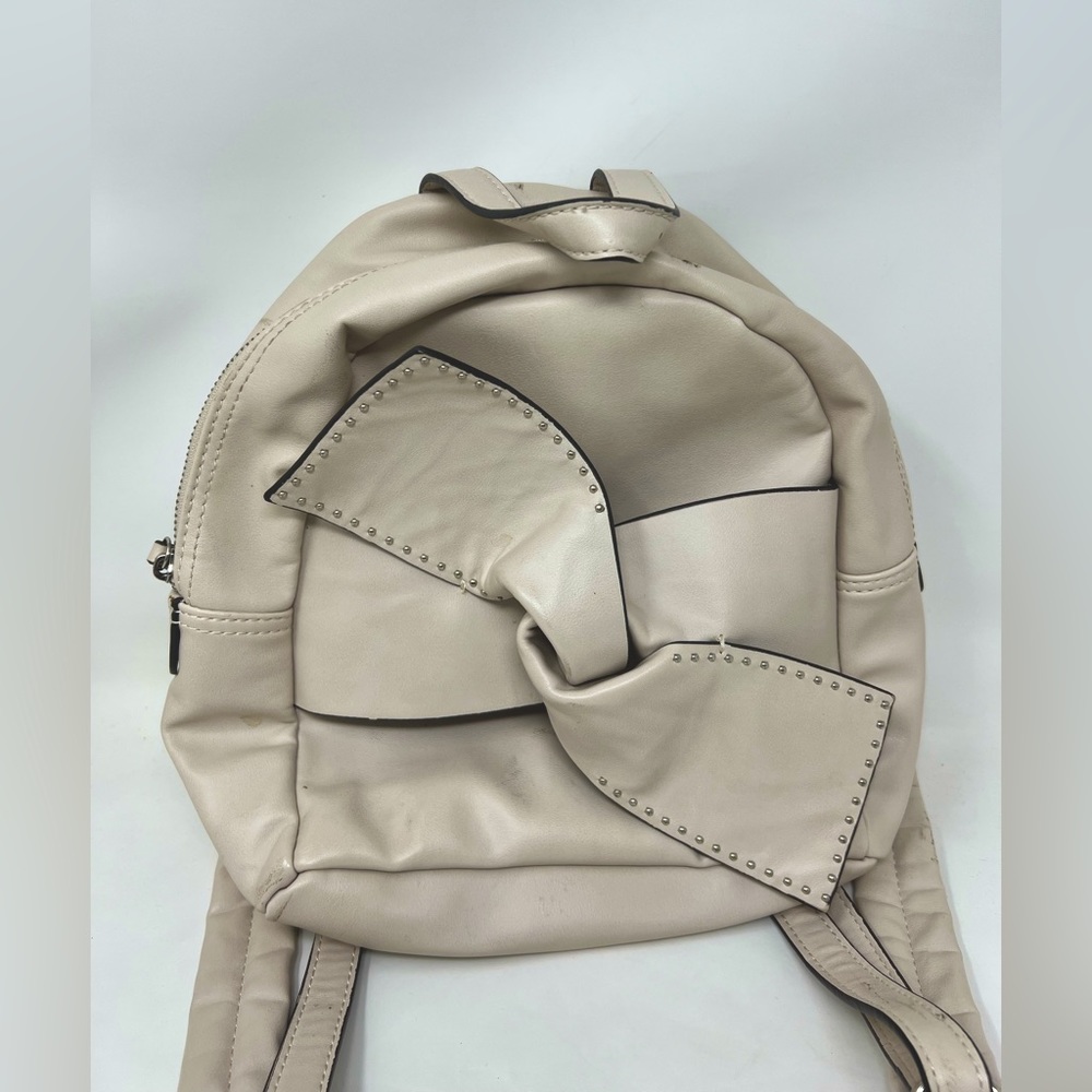 Cream backpack with big bow